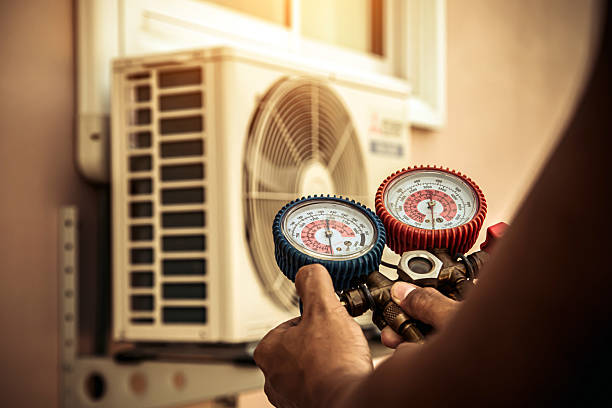 Professional Hvac technician working in Canmer, KY